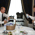 Встреча Путина и Медведева за стаканом молока и буханкой хлеба. Фото: © РИА Новости.